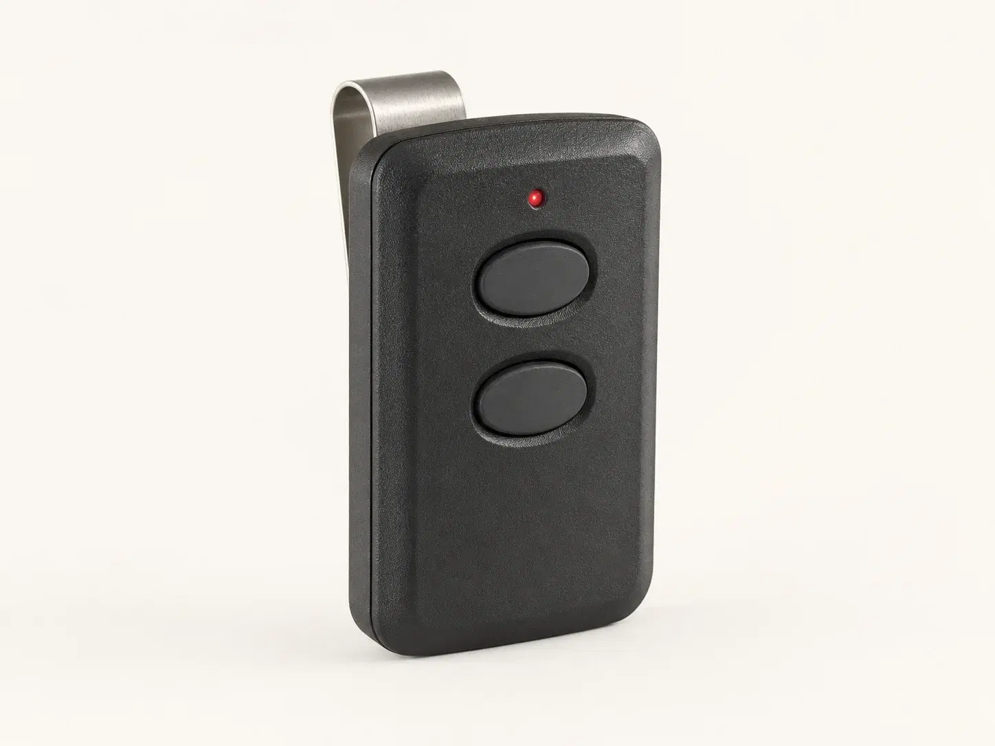 Illustrative rendering of a compact black universal remote with two vertically arranged oval buttons