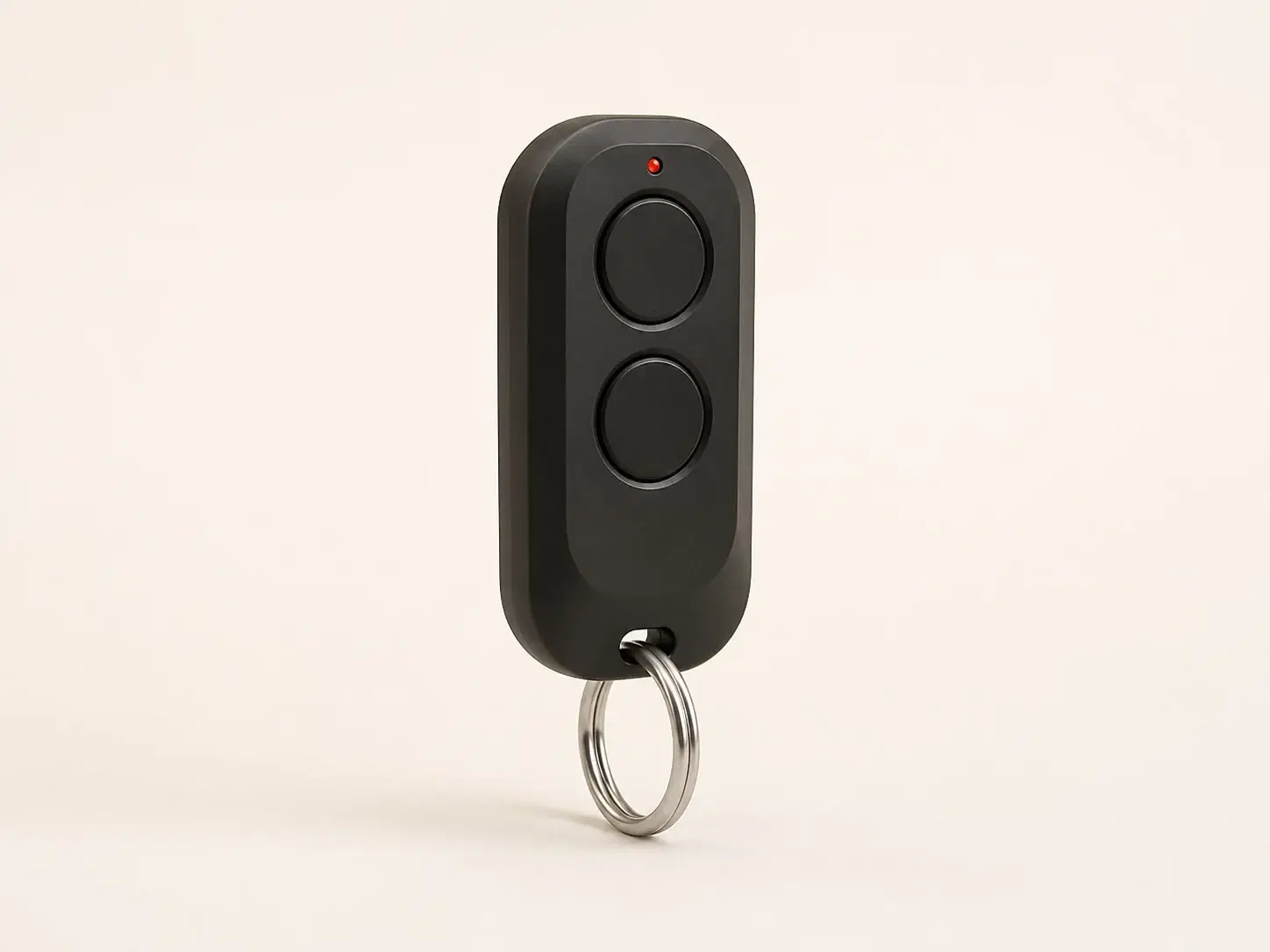 Illustrative rendering of a slim black keychain remote with two vertically stacked buttons