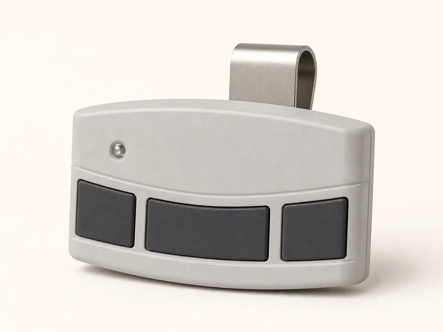 Illustrative rendering of a light gray visor remote with three dark buttons